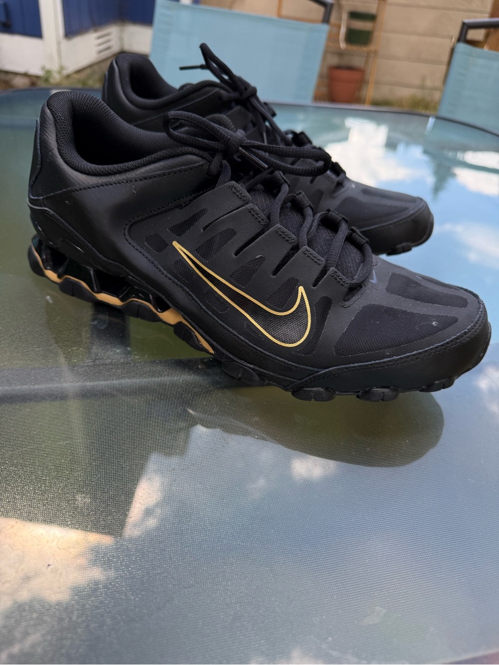 Nike Men’s Reax 8 TR Black Athletic Shoes with Gold Swoosh